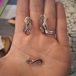 Beautiful matching diamond eternity necklace and earrings